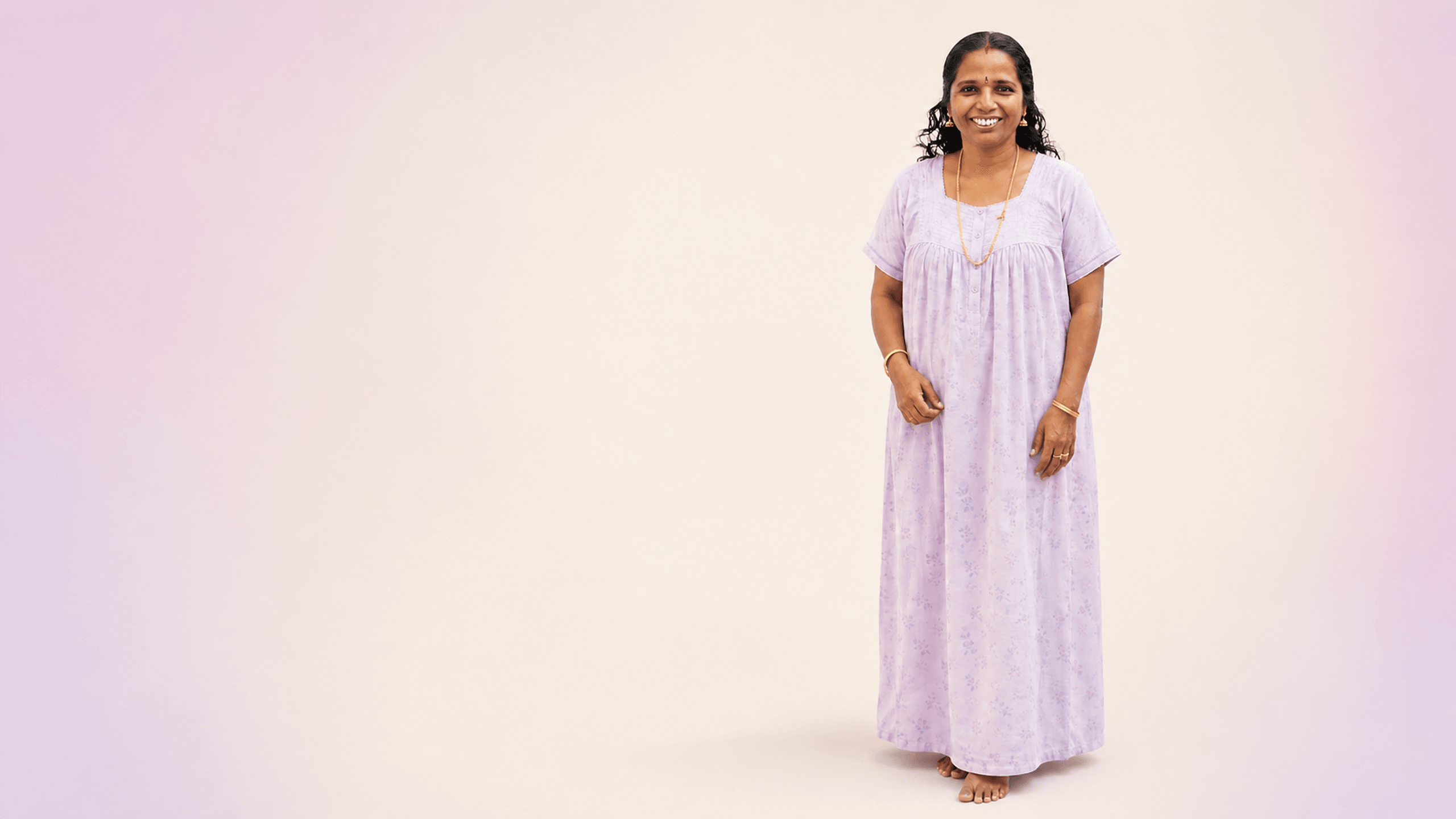 Woman wearing lavender nightwear from DZANE