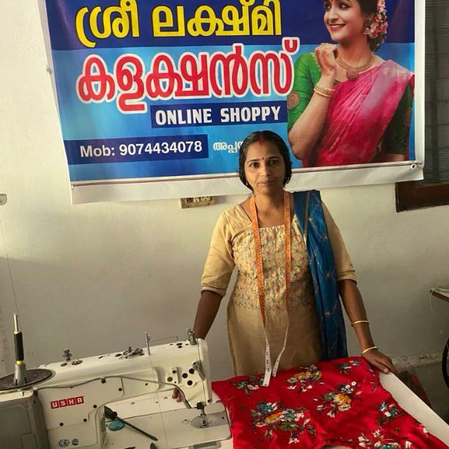 Founder stitching a custom order at the DZANE tailoring studio